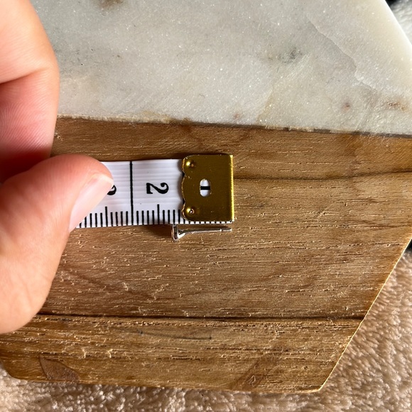 1/10 Ct. Diamond 10k White Gold Bezel Stud Earrings - Picture 9 of 10